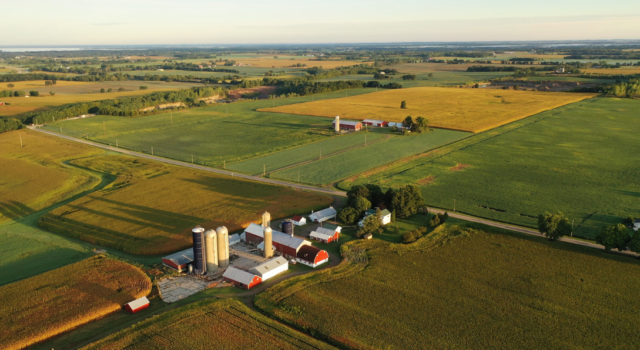 Agriculture landscape showing a farm and crop fields
